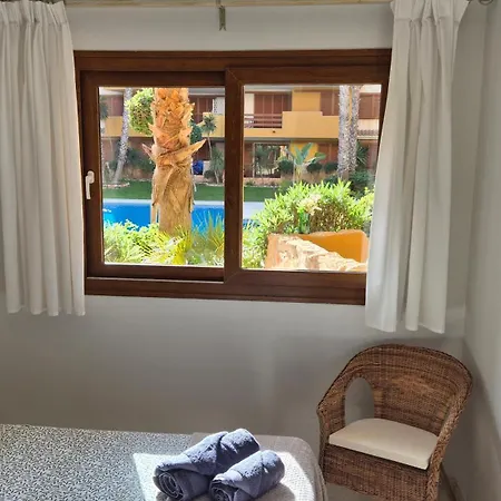 Apartment Ground Floor Punta Prima Looking At The Pool