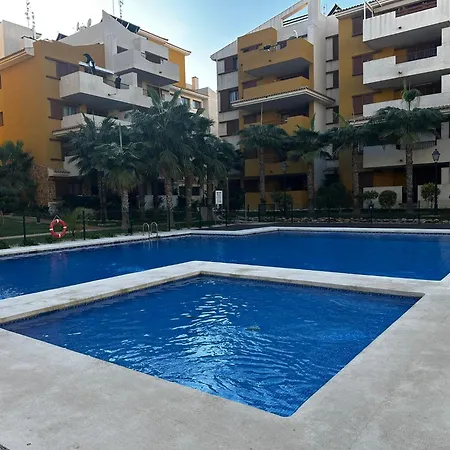 Ground Floor Punta Prima Looking At The Pool *